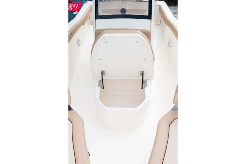 Slide: The Image of 2026 Scout 240 XSF boat interior with compact marine toilet. - 9
