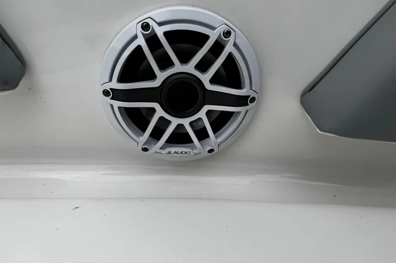Slide: The Image of 2023 Chaparral 21 SSi OB boat speaker, JL Audio, mounted on white surface. - 15