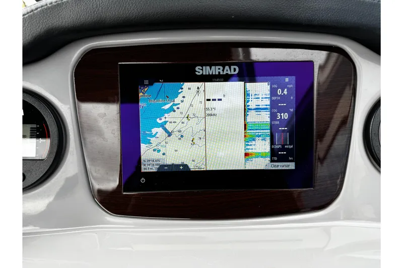 Slide: The Image of Simrad navigation display on 2023 Chaparral 21 SSi OB boat dashboard. - 25