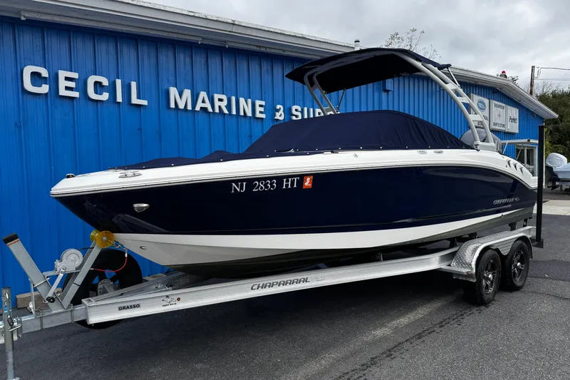 Slide: The Image of 2023 Chaparral 21 SSi OB boat on trailer at Cecil Marine dealership. - 3