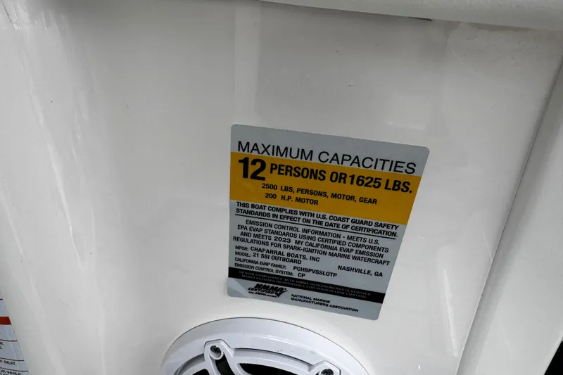 Slide: The Image of 2023 Chaparral 21 SSi OB capacity label: 12 persons or 1625 lbs, 200 HP motor. - 7