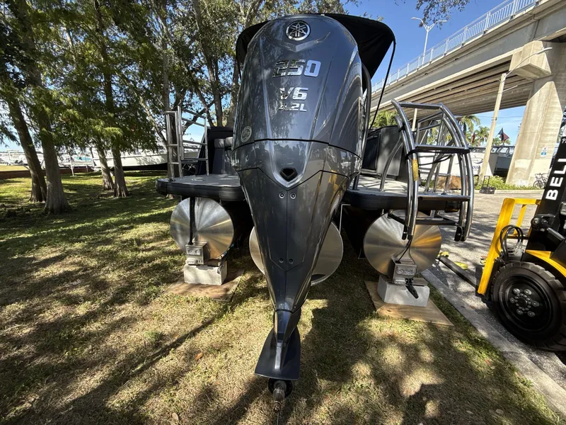 Slide: The Image of Sanpan 2500 MTF pontoon boat with powerful V6 engine, displayed outdoors. - 17