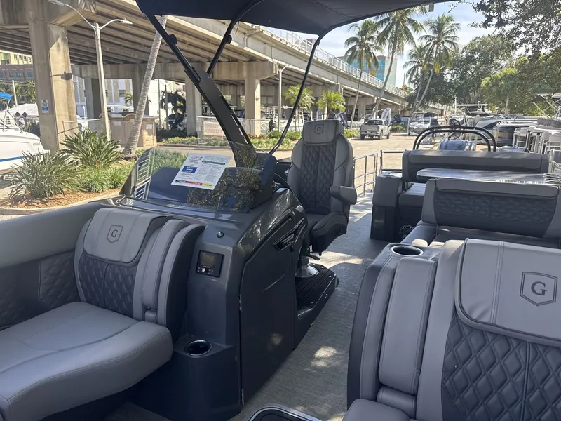 Slide: The Image of Luxurious 2026 Sanpan 2500 MTF pontoon boat with plush seating and modern design. - 19