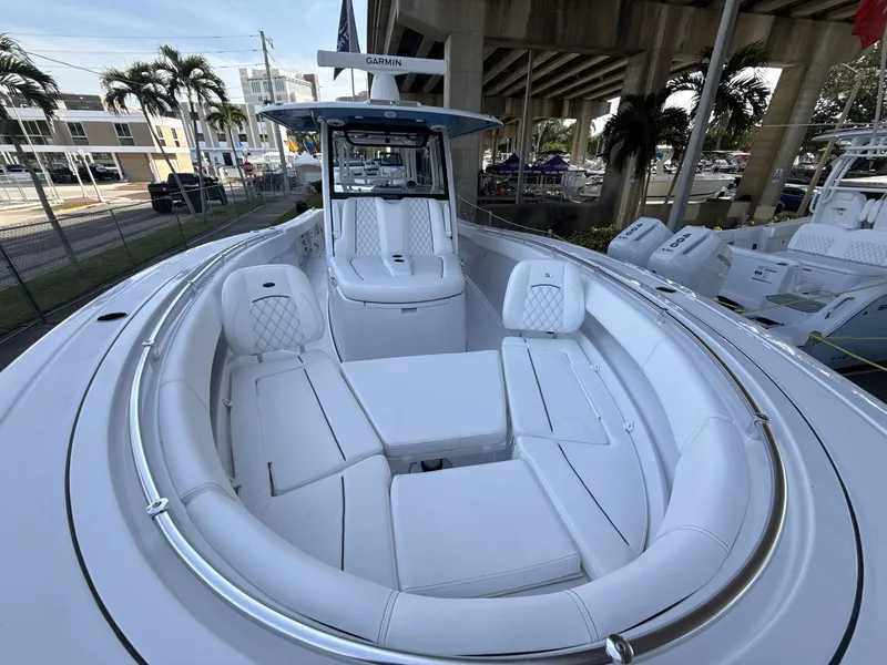 Slide: The Image of 2026 Sportsman Open 352 Center Console boat with luxurious seating and modern design. - 10