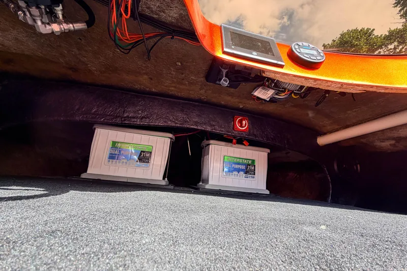 Slide: The Image of Under-deck view of 1984 Sleekcraft Aristocrat 20 with dual batteries and wiring. - 31