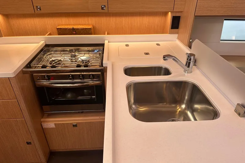 Slide: The Image of Full Galley With Stove/Oven And Pull Out Fridge  & Freezer - 30