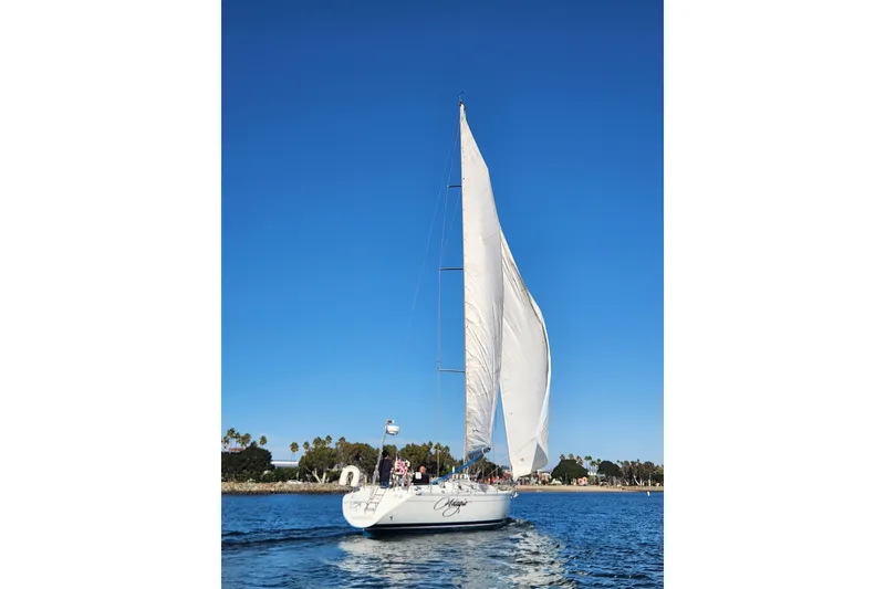 Slide: The Image of Sailing yacht Beneteau First 405, 1988 model, cruising on a sunny day. - 51