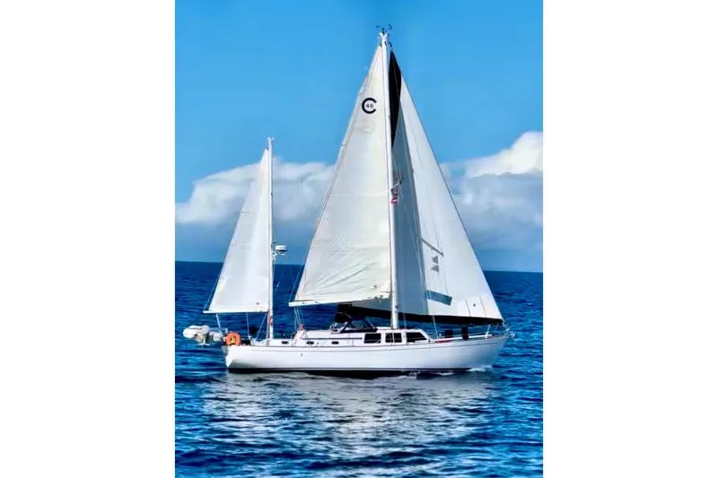 Slide: The Image of 1973 CAL 246 sailboat on open sea with clear blue sky. - 6
