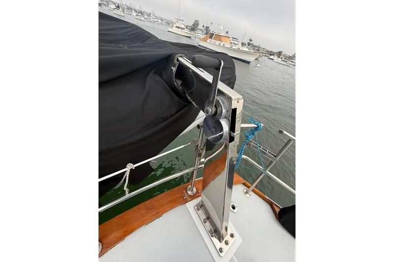 Slide: The Image of 1973 CAL 246 sailboat deck with winch and marina view. - 72