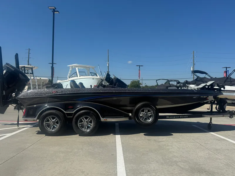 Slide: The Image of 2019 Ranger Z520L boat on trailer in parking lot, clear sky background. - 3