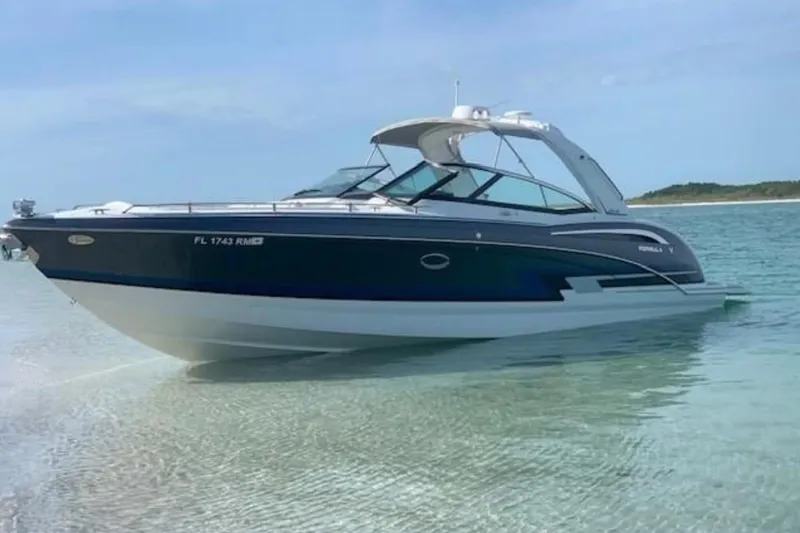 The Image of 2018 Formula 350 Crossover Bowrider in shallow water, showcasing sleek design and luxury features. - 0