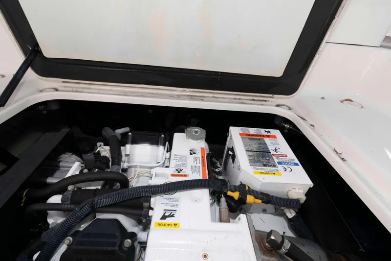 Slide: The Image of Engine compartment of 2018 Formula 350 Crossover Bowrider with visible components and wiring. - 25