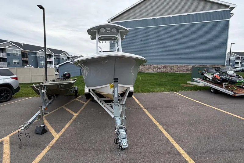 Slide: The Image of 2023 Sea Pro 219 Center Console boat on trailer in parking lot. - 10