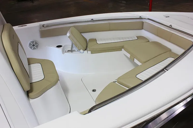 Slide: The Image of 2023 Sea Pro 219 Center Console boat on trailer in residential area. - 2