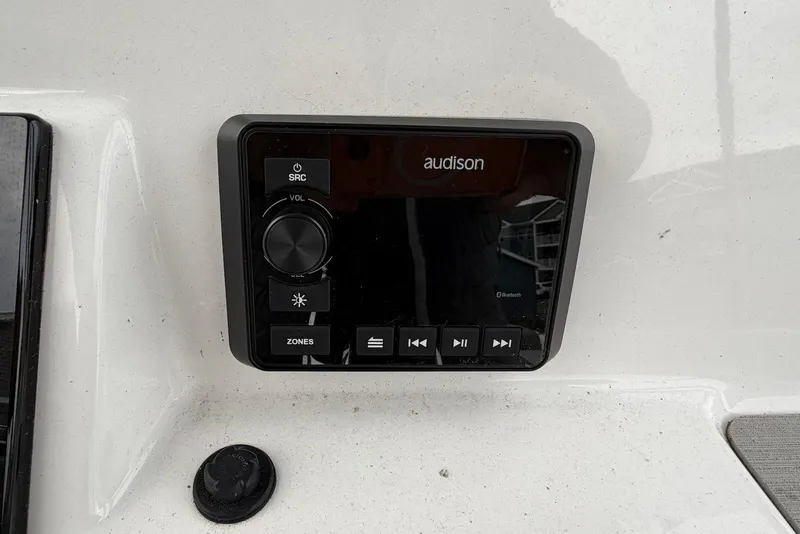 Slide: The Image of Audison audio control panel on 2023 Sea Pro 219 Center Console boat. - 23