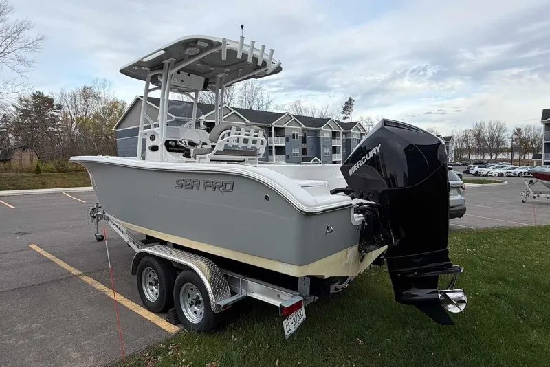 Slide: The Image of 2023 Sea Pro 219 Center Console boat on trailer, parked outdoors. - 3
