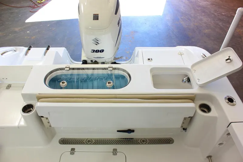 Slide: The Image of 2023 Sea Pro 219 Center Console boat on trailer in residential parking area. - 6