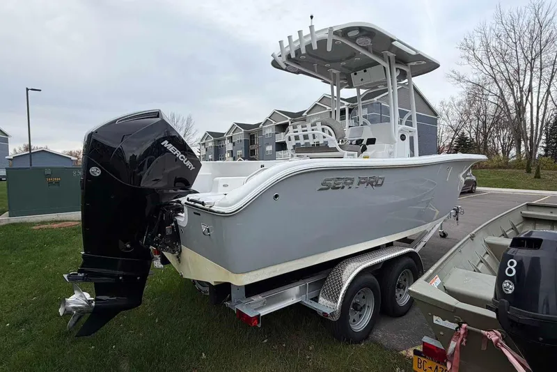 Slide: The Image of 2023 Sea Pro 219 Center Console boat on trailer with Mercury outboard motor. - 7