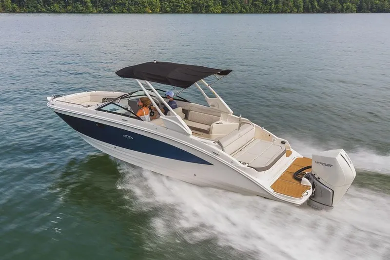 Slide: The Image of Manufacturer Provided Image: 2023 Sea Ray SDX 270 Outboard cruising on a lake. - 19