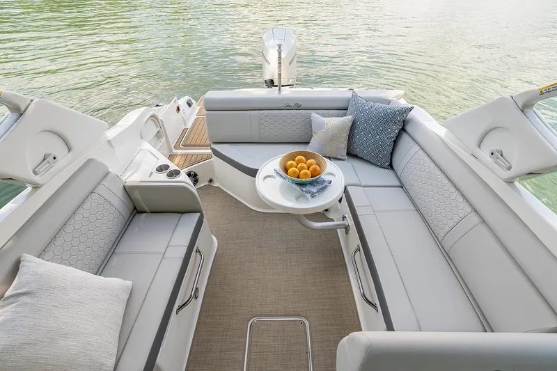 Slide: The Image of Manufacturer Provided Image: 2023 Sea Ray SDX 270 Outboard boat bathroom with sink and toilet. - 9