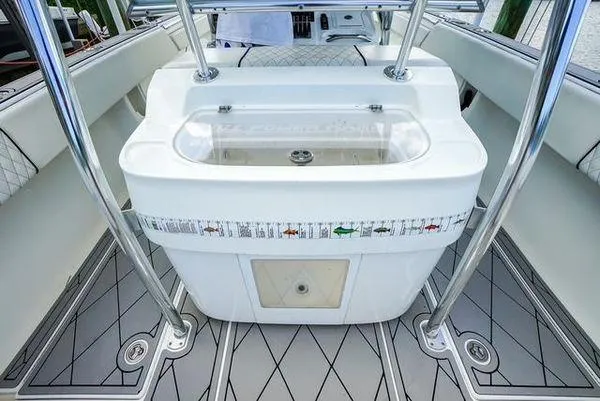 Slide: The Image of 2007 Spectre 37 Center Console boat dashboard with navigation and control systems. - 20