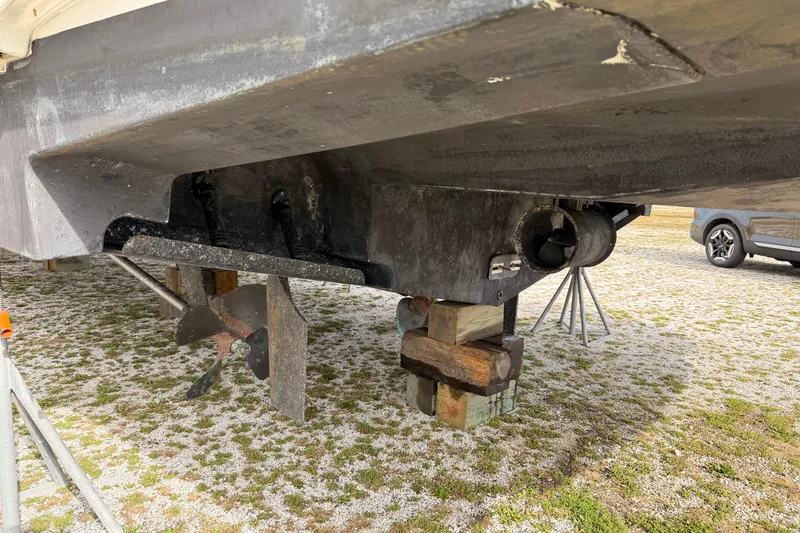 Slide: The Image of 2003 Carver 564 Cockpit Motor Yacht hull and propeller on dry dock. - 3