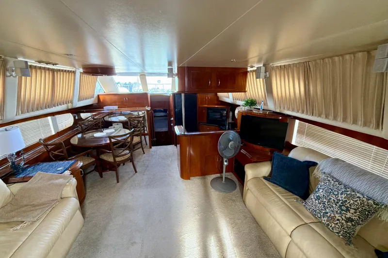 Slide: The Image of Luxurious interior of 2003 Carver 564 Cockpit Motor Yacht with elegant furnishings. - 20