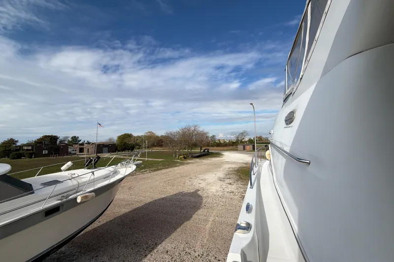 Slide: The Image of Luxurious kitchen interior of 2003 Carver 564 Cockpit Motor Yacht with modern appliances. - 30