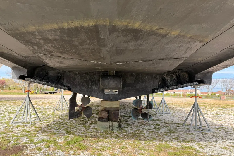 Slide: The Image of Underside view of 2003 Carver 564 Cockpit Motor Yacht on stands. - 4