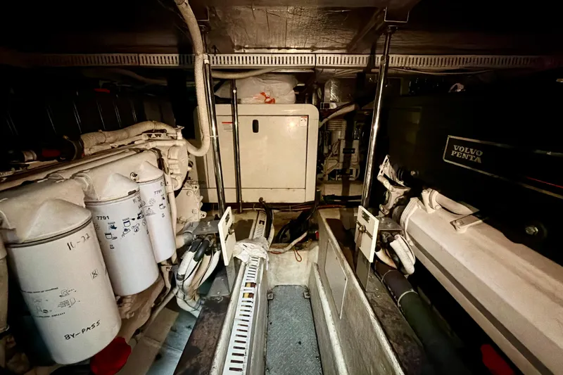Slide: The Image of Engine room of 2003 Carver 564 Cockpit Motor Yacht with Volvo Penta components. - 52