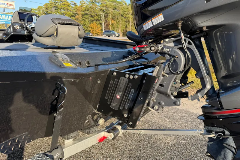 Slide: The Image of Rear view of 2025 Xpress X21 Pro boat with motor and trailer attachment. - 18