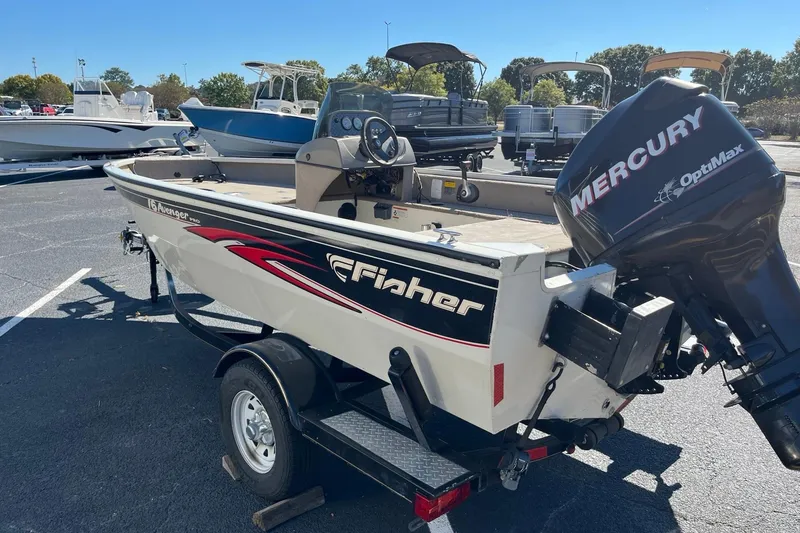 Slide: The Image of 2008 Fisher 160 Pro Avenger SC boat with Mercury OptiMax engine on trailer. - 4