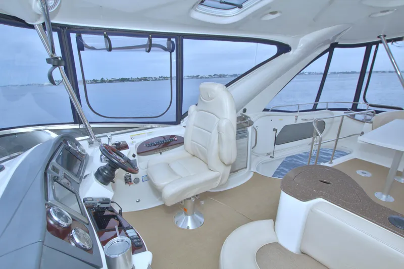 Slide: The Image of Luxurious interior of a 2013 Meridian 441 Sedan yacht with panoramic windows. - 14