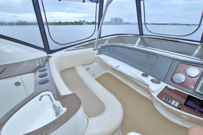 Slide: The Image of Interior of 2013 Meridian 441 Sedan yacht with luxurious seating and control panel. - 19