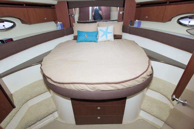 Slide: The Image of Luxurious bedroom interior of 2013 Meridian 441 Sedan yacht with cozy bedding. - 44
