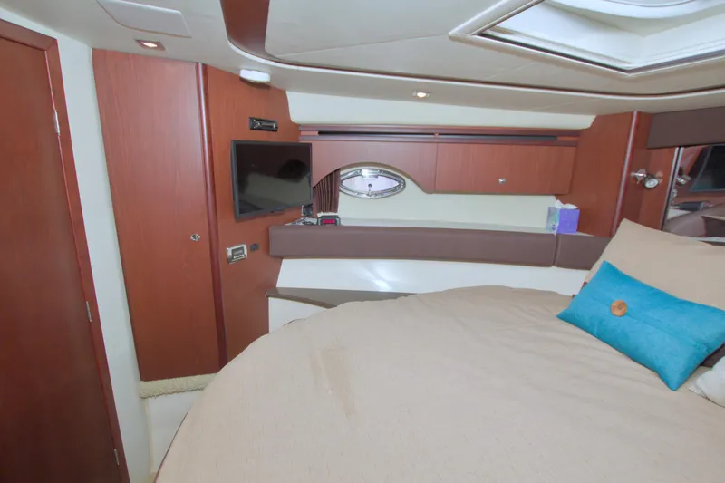 Slide: The Image of Luxurious interior of 2013 Meridian 441 Sedan yacht with cozy bed and modern amenities. - 46