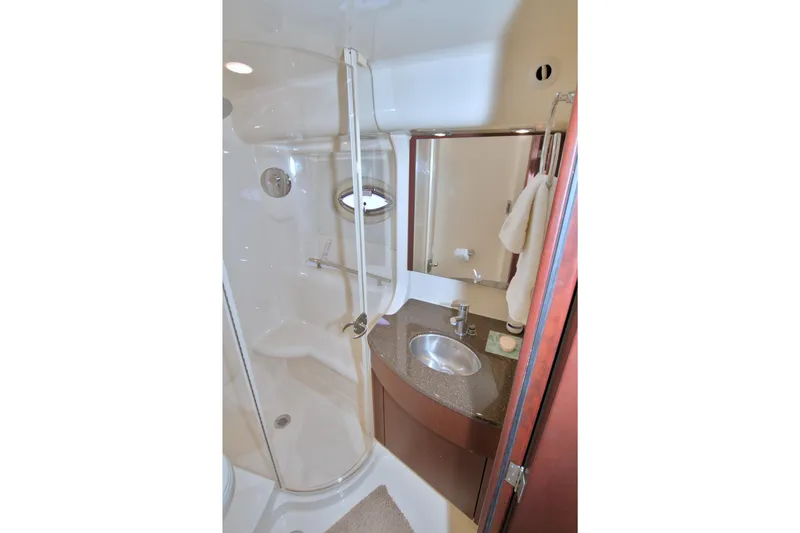Slide: The Image of Luxurious bathroom in 2013 Meridian 441 Sedan yacht with shower and sink. - 48