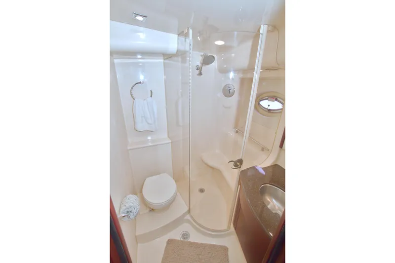 Slide: The Image of Bathroom interior of 2013 Meridian 441 Sedan yacht, featuring shower and toilet. - 49