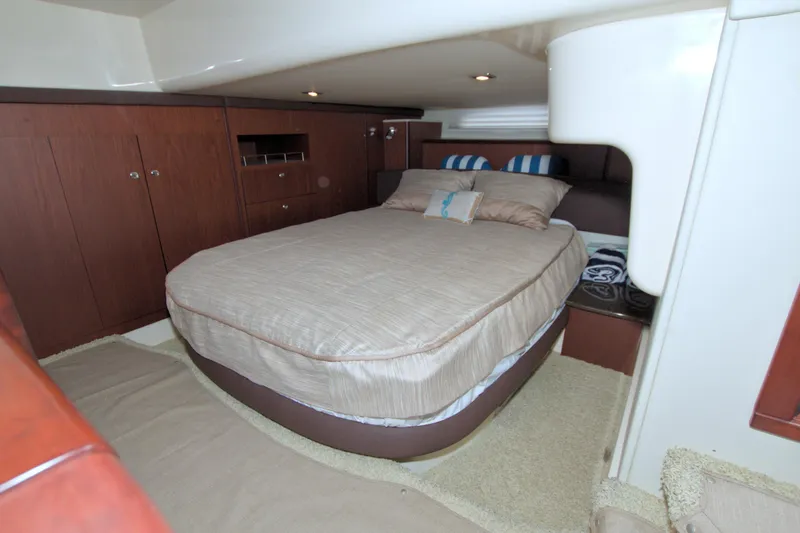 Slide: The Image of Luxurious bedroom interior of 2013 Meridian 441 Sedan yacht with cozy bedding. - 53