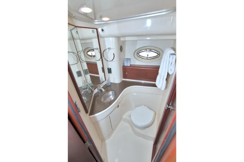 Slide: The Image of Luxurious bathroom in 2013 Meridian 441 Sedan yacht with modern fixtures and elegant design. - 59