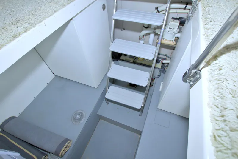 Slide: The Image of Engine room access with ladder in 2013 Meridian 441 Sedan yacht. - 62