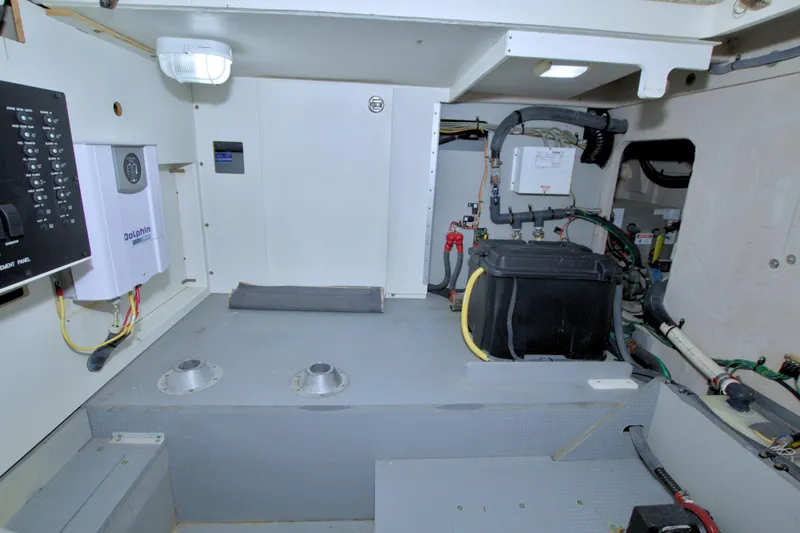 Slide: The Image of Engine room of 2013 Meridian 441 Sedan yacht with electrical components and battery. - 68