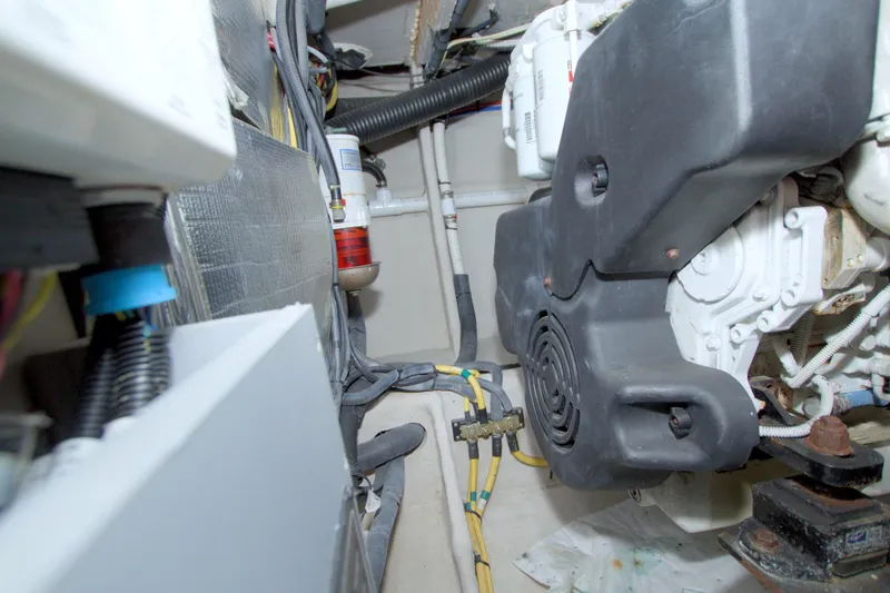 Slide: The Image of Engine room of 2013 Meridian 441 Sedan with visible components and wiring. - 79