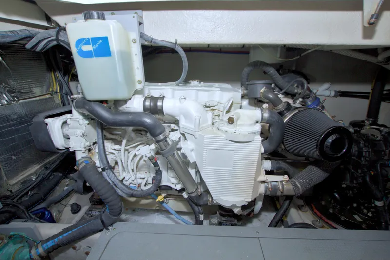Slide: The Image of Engine room of 2013 Meridian 441 Sedan with Cummins Marine engine components. - 80