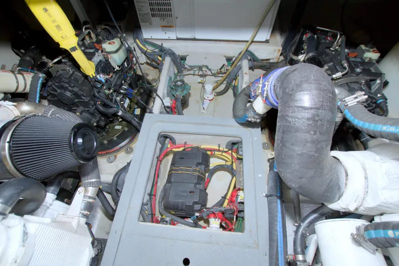 Slide: The Image of Engine room of 2013 Meridian 441 Sedan with visible components and wiring. - 86