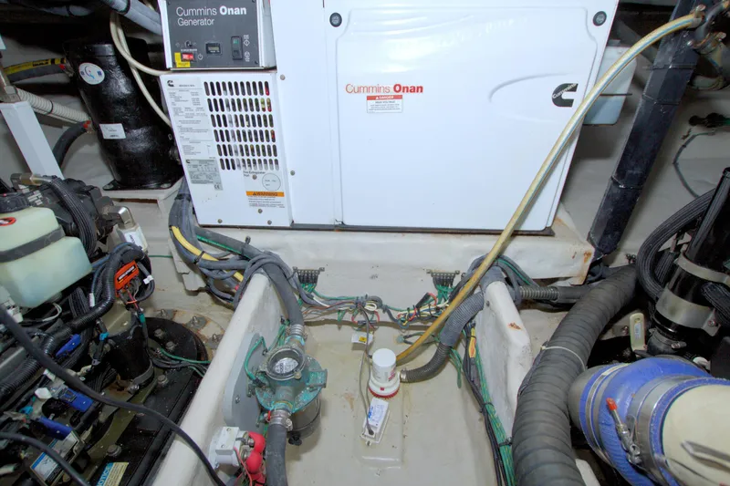 Slide: The Image of Engine room of 2013 Meridian 441 Sedan with Cummins Onan generator. - 87