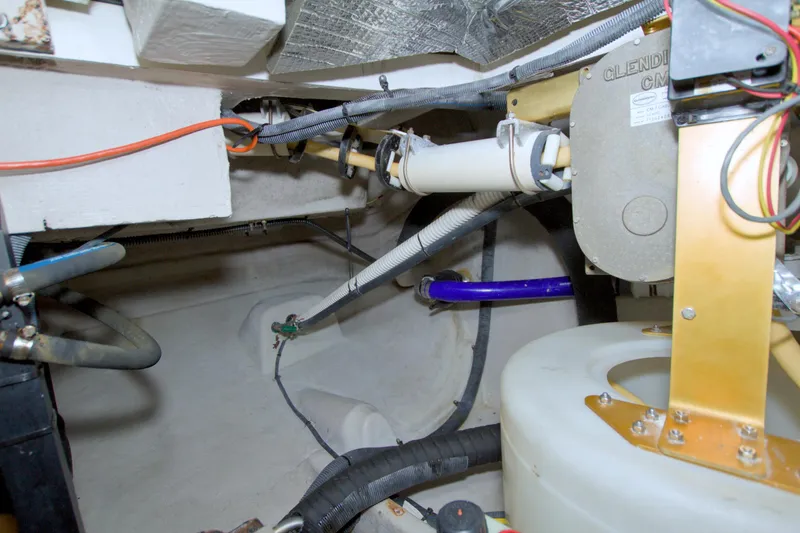 Slide: The Image of Engine room of a 2013 Meridian 441 Sedan with visible wiring and components. - 91