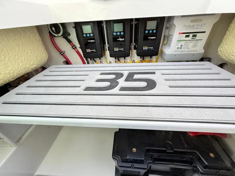 Slide: The Image of 2025 Regulator 35 boat electrical panel with control systems and wiring. - 22