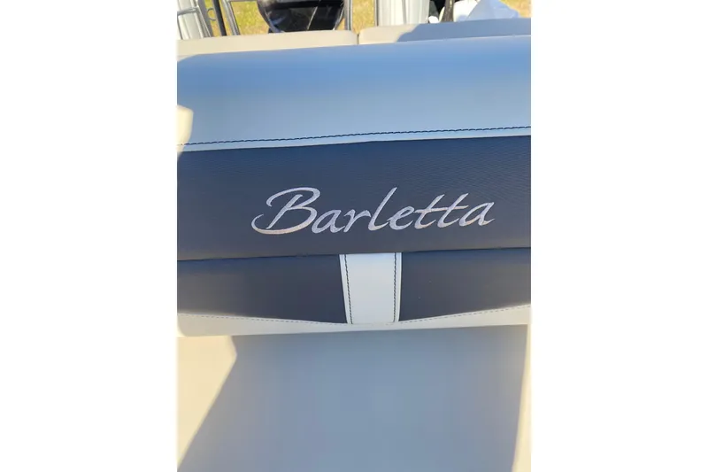Slide: The Image of Barletta Cabrio 22UC 2022 boat seat with elegant stitching and logo. - 13