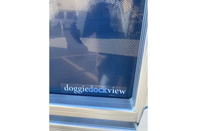 Slide: The Image of Barletta Cabrio 22UC 2022 with "doggiedockview" feature, showcasing a perforated panel. - 16